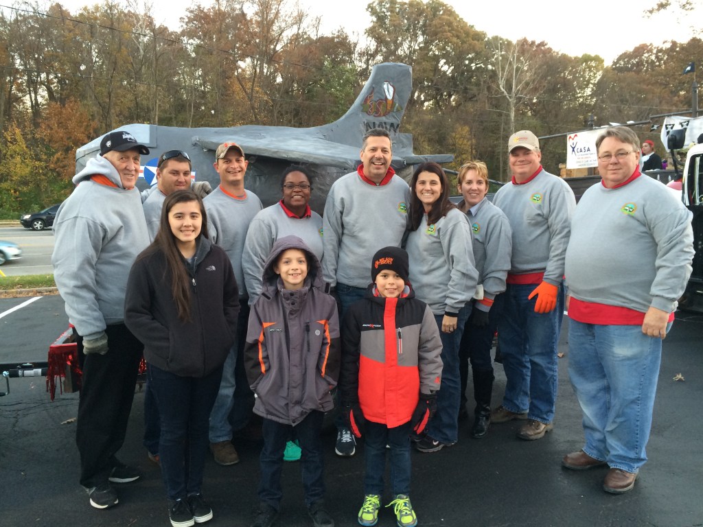 Members of Edwardsville Township Board, park personnel and administrative staff debut the Airplane Overhaul float at the Edwardsville Halloween Parade October 31, 2014.